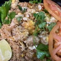 SP1. Crab Fried Rice · Fried rice with egg, onion and mixed vegetables, and crab meat.