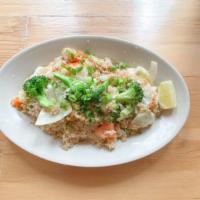 96. House Special Fried Rice · Fried rice with egg, onions, and mixed vegetables.
