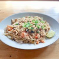 97. Pineapple Fried Rice · Fried rice with egg, chunks of pineapple, onions, cashew nuts and mixed vegetables.