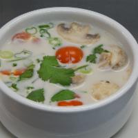 20. Tom Ka Soup · Choice of item in a light coconut milk and mushroom soup with Thai herbs and tomatoes.  Mild...