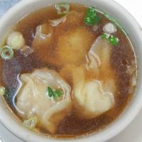 22A. Wonton Soup · Chicken and shrimp wonton in a savory soup with scallions, cilantro, and fried garlic.