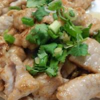 Dinner Moo Tohd Kartiem Prihk Thai · Stir-fried pork, peppers, garlic, green onion, and a brown sauce.