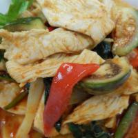 32. Red Curry · Choice of protein, bamboo shoot, red peppers, green peppers, Thai eggplant, coconut milk and...