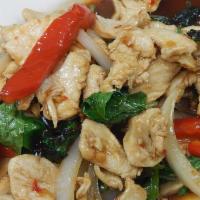 27. Krapow · Choice of protein sauteed with fresh basil leaves, red peppers, green peppers and onions in ...
