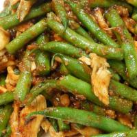 29. Pad Prik King · Choice of protein with green beans stir-fried with red curry paste. Mild spice.