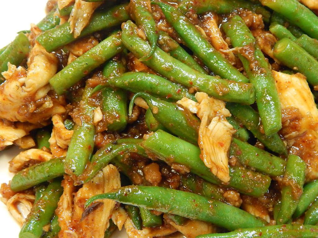 29. Pad Prik King · Choice of protein with green beans stir-fried with red curry paste. Mild spice.