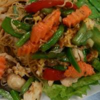 66. Mee Pad · Choice of meat stir-fried with egg noodles, scallions, carrots, celery, bell peppers and mus...