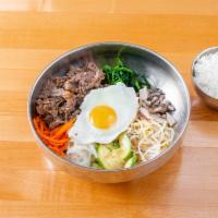 Bulgogi Bibimbap · Rice mixed with egg, vegetables, choice of meat, and spicy sauce.