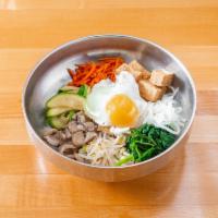 Tofu Bibimbap · Rice mixed with egg, vegetables, choice of meat, and spicy sauce.