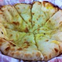 Cheese Naan · Naan Stuffed with Mozzarella cheese and baked in clay oven .