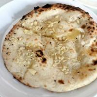 Garlic Cheese Naan  · Garlic Naan Stuffed with cheese and baked in clay oven