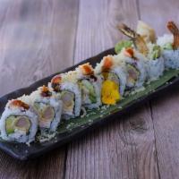 Crunch Roll · Shrimp tempura, crab, avocado, cucumber, crunch outside topped with eel sauce.