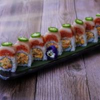 Spicy Albacore Tataki Roll · Spicy soft shell crab, cucumber, wrapped with spicy tuna, topped with albacore, jalapeño wit...