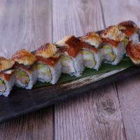 Rattle Snake Roll · Shrimp tempura, crab, cucumber, wrapped with spicy tuna topped with eel served with eel sauce.
