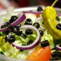 Dinner Salad · Lettuce tomatos cucumbers onions olives and pepperchinis