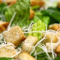 Caesar Salad · Romaine lettuce with Caesar dressing, croutons and Parmesan cheese.