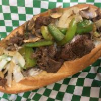 Philly Steak Sandwich · No cheese. Thinly sliced prime beef cooked to perfection and served on a hot oven-toasted ro...