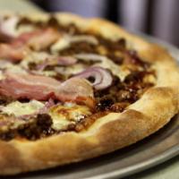 Gold Rush Pizza · BBQ sauce, ground beef, crispy bacon, red onions and light cheese.