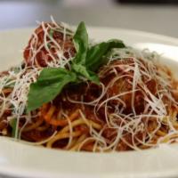 Spaghetti with Meatballs · Served with a small side salad and bread.