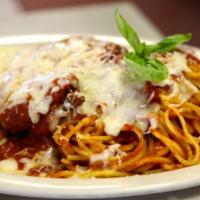 Chicken Parmigiana · Homemade breaded chicken breast with your choice of spaghetti or ziti. Served with a small s...