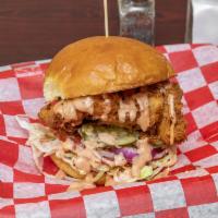 Fried Chicken Sandwich · Double dipped, buttermilk fried chicken served with lettuce, tomato, red onion, pickles and ...