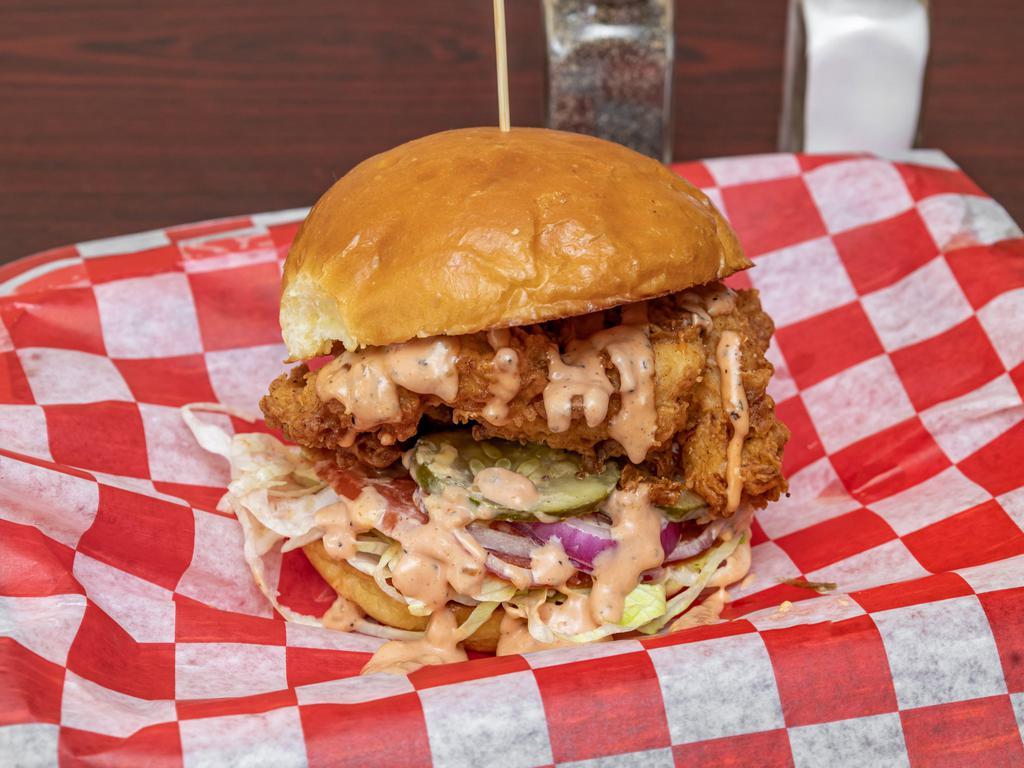Fried Chicken Sandwich · Double dipped, buttermilk fried chicken served with lettuce, tomato, red onion, pickles and special sauce.