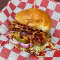 Rodeo Burger · Our classic single 5 oz Angus burger topped with Bacon, Melted Cheddar, Crispy Fried Onions ...