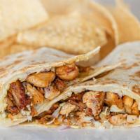 Chicken Quesadilla · Flour tortilla with melted Monterey Jack cheese, mesquite grilled chicken, diced cabbage and...