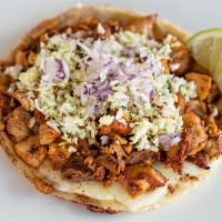 Chicken Gordita · Handmade corn tortilla topped with Monterey Jack cheese, mesquite grilled chicken, diced cab...