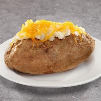 Baked Potato · Baked Potato topped with sour cream, cheese and margarine.
