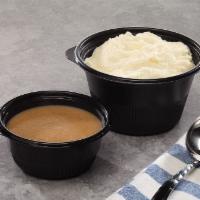 Mashed Potatoes & Gravy · Creamy Mashed Potatoes with a side of brown gravy. Mashed Potatoes served in a 24. oz. bowl. 