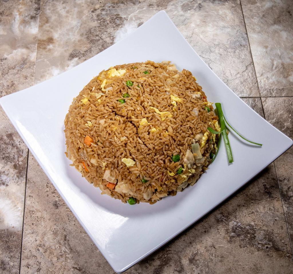 Fried Rice · Fried rice with peas & carrots, onion, green onion, egg, and choice of meat or vegetables.