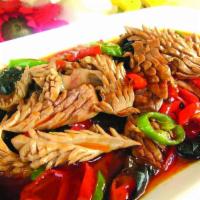 57. Stir Fined Pork Kidney / 火爆腰花 · Pork kidney stir fried with green and red peppers, onions, cucumber, and black fungus.