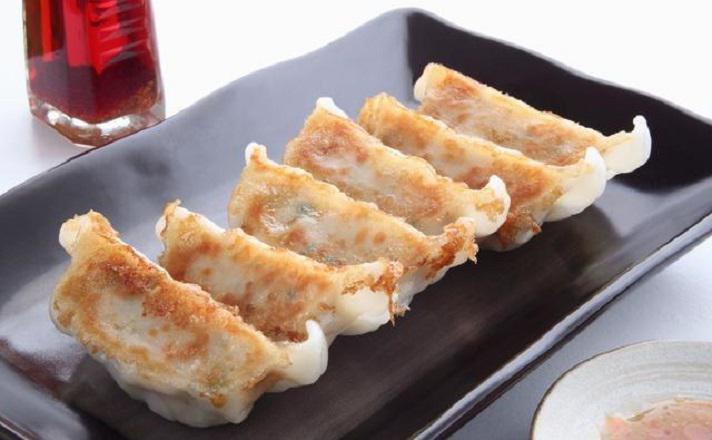 84. Pork Potstickers / 鮮肉鍋貼 · 10 pieces of fried dumplings stuffed with pork.