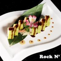 Rock-N-Roll · 8 pieces. Shrimp tempura, spicy tuna, crunch, masago, mango, avocado and cucumber wrapped wi...