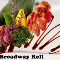 Broadway Roll · 8 pieces. Shrimp tempura with cream cheese inside, spicy tuna on top, eel sauce.