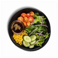 Pepper Salad · Cucumbers, cherry tomatoes, onions, and corn over mixed greens