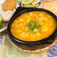 Mondongo Soup · Original tripe soup with pork, yellow and white potatoes, spices, and cilantro. Accompanied ...