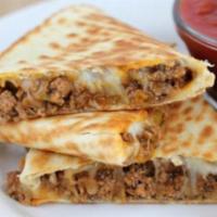Meat and Cheese Quesadilla ·  Add a huevo for an additional charge.