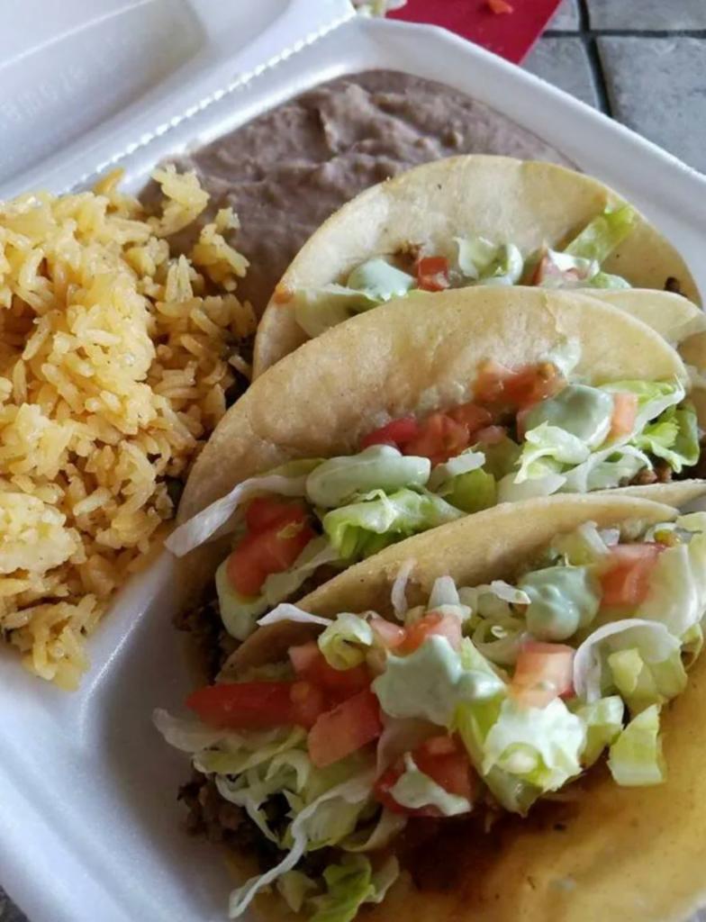 Street Taco Combo Plate · 3 street style tacos soft corn tortilla choice of meat, avo-cream, cilantro, diced onion, beans, and rice.