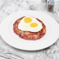 Corned Beef Hash and Eggs · 10 oz. of corned beef, potato and onion and 2 over easy eggs. Served with choice of side.