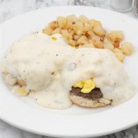 Country Benedict · Our down-home biscuit, open-faced, topped with 2 sausage patties and 2 scrambled eggs, with ...