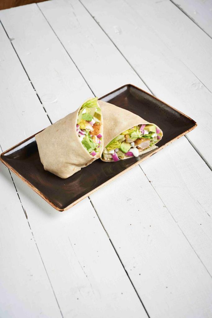 Bonchon Wrap · Freshly sliced avocado on a bed of crisp lettuce, onion,
seasoned with buttermilk ranch dressing, spicy mayo,
wrapped in a warm flour tortilla.