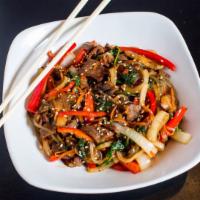 Japchae · Glass noodles, red pepper, carrots, onions, spinach,
mushrooms and thinly sliced marinated b...
