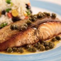 Pan-Seared Salmon · Served with vegetable rice and raisins and topped with passion fruit glaze and capers. Serve...