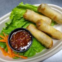 Spring Rolls Vegetable · Four deep fried spring rolls. Rolls are filled with mushroom, bean thread noodle, cabbage,ca...