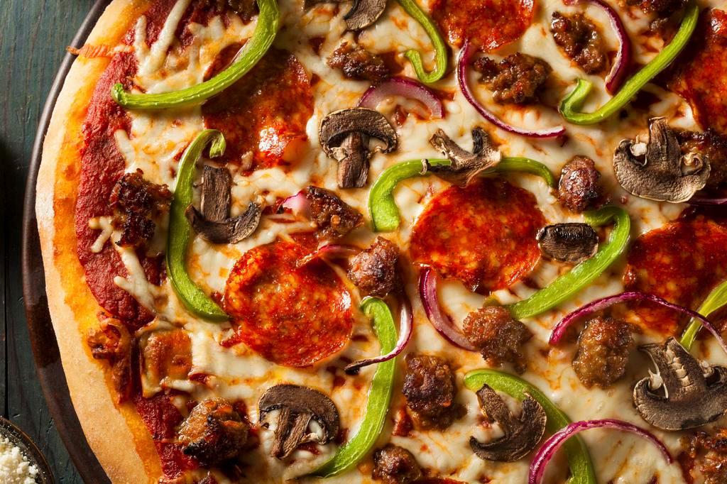 Supreme Pizza · Mozzarella cheese, Pepperoni, Sausage, Mushrooms, Onions and Green Peppers.