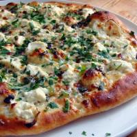 White Pizza · Mozzarella cheese, Fresh Garlic, Ricotta Cheese,Fresh Basil and Parmesen Cheese.