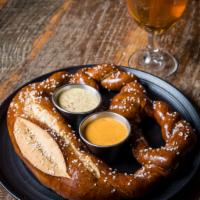 Stone Delicious Bavarian Pretzel · All natural artisan hand rolled jumbo pretzel made with Stone Delicious IPA served with IPA ...