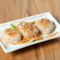 Pan Fried Shrimp and Corn Cake - 甘香粟米饼 · Shrimp and corn stuffed in wonton wrappers, and pan fried
